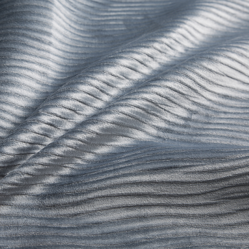 Wrap Knitting Fabric je textilná štruktúra pozostávajúca zo slučiek vyrobených z viacerých priadzí
